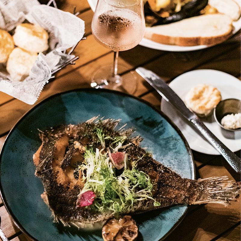 Local seafood is the specialty at the Fish House, including dinners of whole fried flounder over purloo and Bull’s Bay bouillabaisse with shrimp and fennel. 