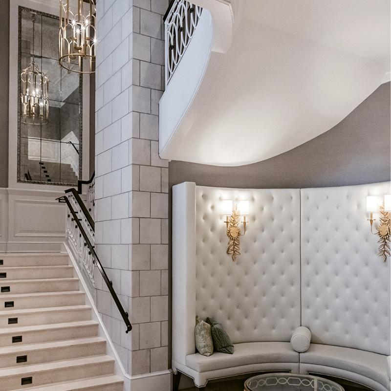 The marble lobby entrance leads to a rotunda with Lowcountry-themed murals.