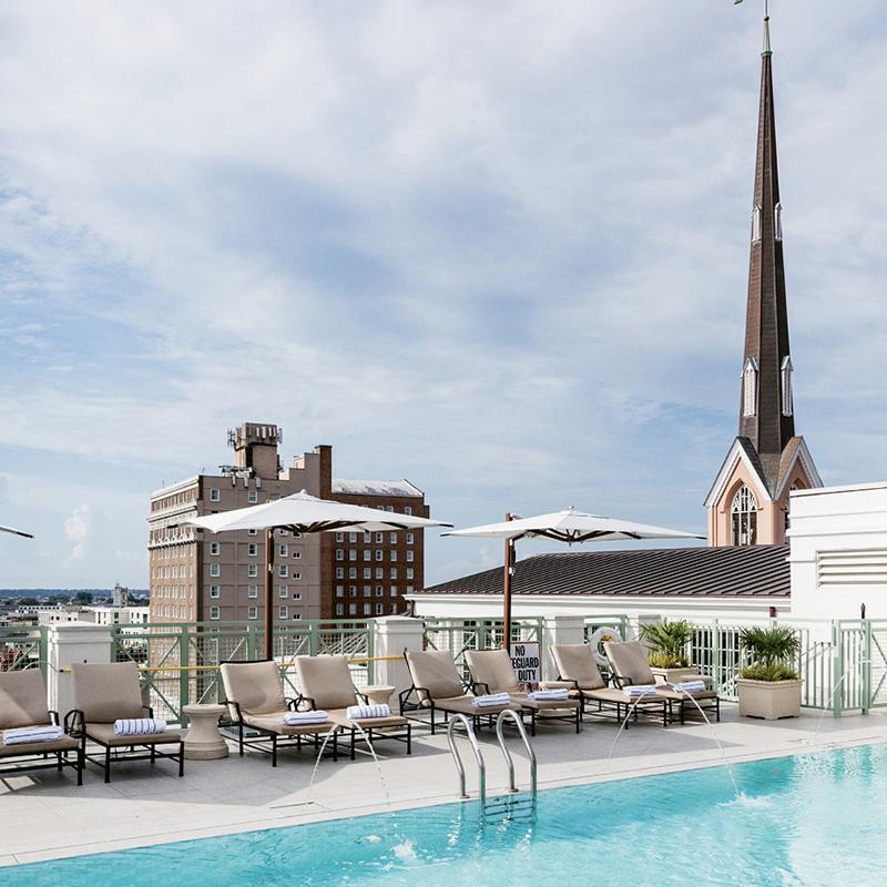 Exclusive to hotel guests, the rooftop pool has private rental cabanas outfitted with TVs, refrigerators, and fans.